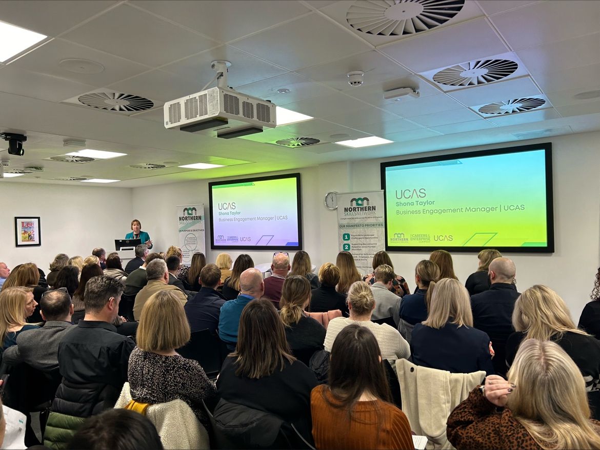 An image of a room full of people listening to a speaker at the Northern Skills Network Careers Summit